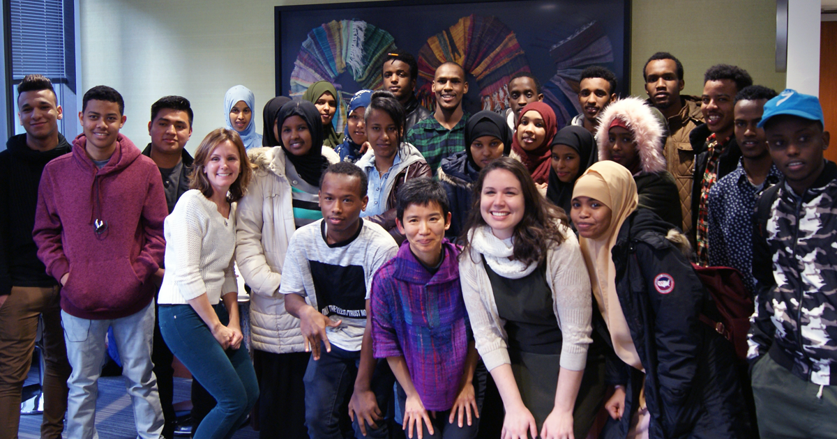 Students and teacher together in class