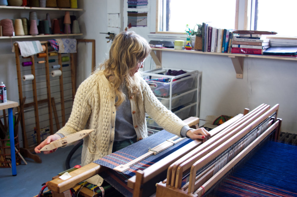 portrait of weaver at loom