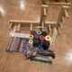 Inkle Loom, yarn, and book